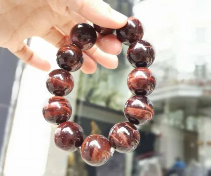 Chuỗi mắt mèo đỏ đô 18 li S6439